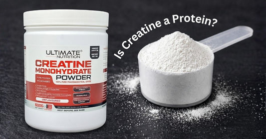ultimate nutrition creatine monohydrate powder container with a scoop of creatine on a dark surface shown beside the text is creatine a protein to illustrate the difference between creatine and protein for the article is creatine a protein the most google