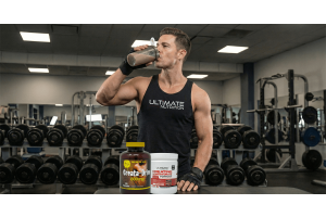 Ultimate Nutrition Creata‑Drive and Creatine Monohydrate powder showcased in a gym setting with an athlete training, highlighting strength, power, and performance benefits.