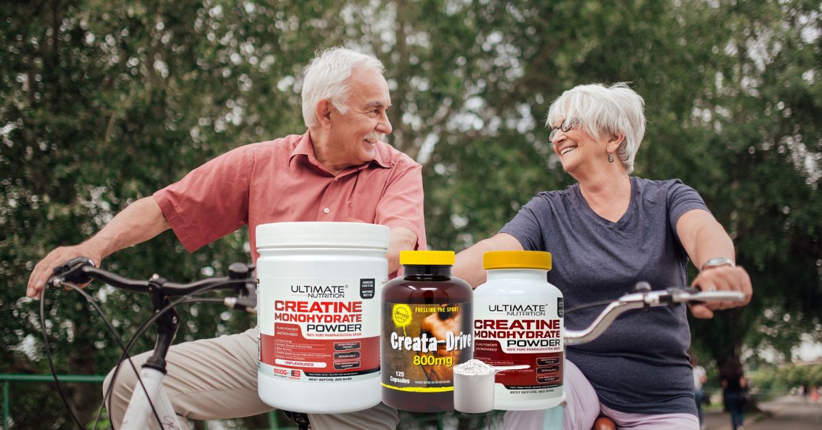 Older adults riding bicycles outdoors with Ultimate Nutrition creatine supplements displayed in the foreground, highlighting strength and vitality for active aging.
